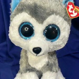 New with tags!! 10 inches tall. TY  - SLUSH  the Husky (Glitter Eyes) 💙